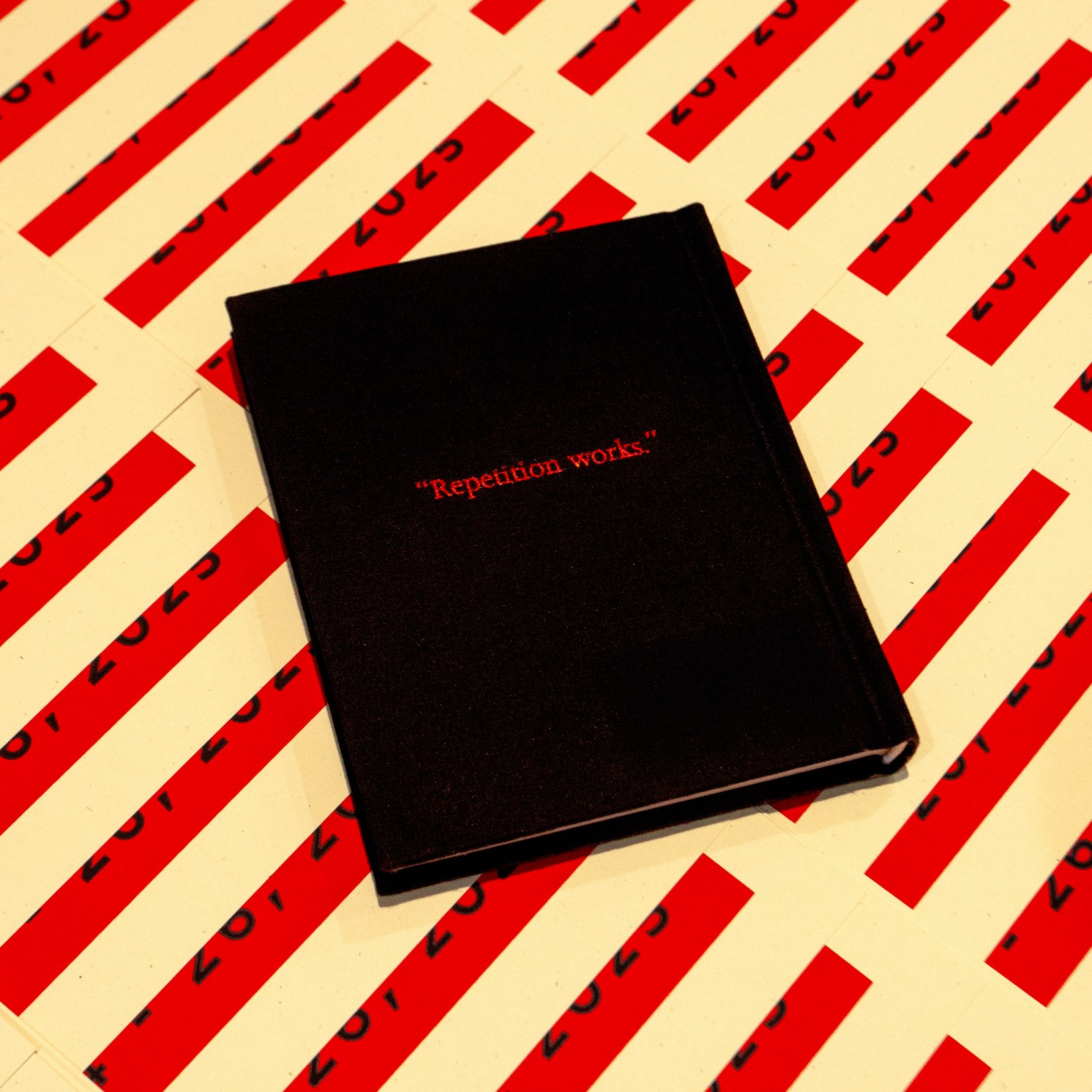 A black book with the text